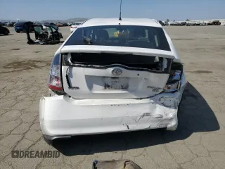 2005 Toyota Prius with VIN JTDKB20U553016279, listed as a Copart auction lot 55313885 with 219,516 mi miles and Salvage Title. Bid and sale history available at DreamBid. Image 6.