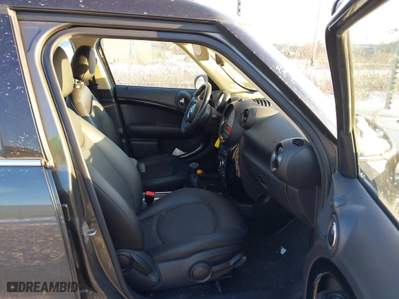 2013 MINI Cooper Countryman with VIN WMWZB3C58DWM31146, listed as a IAAI auction lot 41423661 with 97,505 mi miles. Bid and sale history available at carsss.com. Image 5.