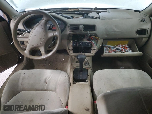 2002 Mitsubishi Galant ES z VIN 4A3AA46G82E139759, wystawiony jako Copart lot #83616994 z przebiegiem 184 814 mil mil oraz Szkoda całkowita • Salvage title. Historia ofert i sprzedaży dostępna na DreamBid. Obrazek 8.