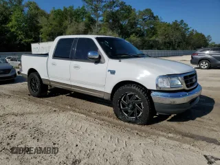 2001 Ford F-150 XLT with VIN 1FTRW07W11KB44405, listed as a Copart auction lot 53560595 with 272,881 mi miles and Salvage title. Bid and sale history available at DreamBid. Image 4.