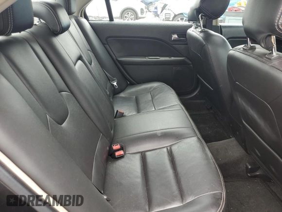 2012 Ford Fusion SEL z VIN 3FAHP0JG2CR433596, wystawiony jako Copart lot #59769105 z przebiegiem 126 230 mil mil oraz Czysty tytuł • Clean title. Historia ofert i sprzedaży dostępna na DreamBid. Obrazek 10.