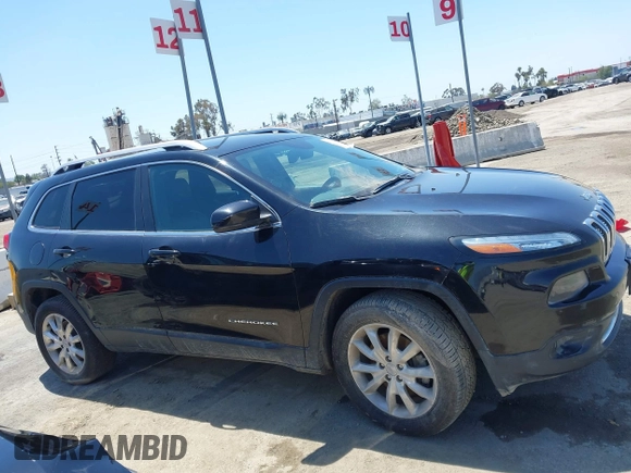 2014 Jeep Cherokee Limited with VIN 1C4PJMDB9EW210180, listed as a IAAI auction lot 41302037 with 75,177 mi miles and . Bid and sale history available at DreamBid. Image 13.
