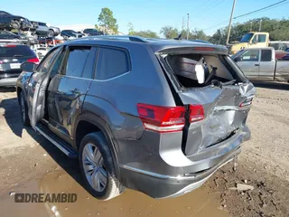 2020 Volkswagen Atlas SEL with VIN 1V2ER2CA0LC505307, listed as a IAAI auction lot 41290000 with 54,537 mi miles and . Bid and sale history available at DreamBid. Image 3.