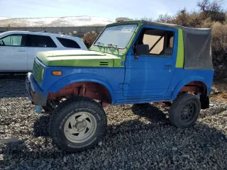 1986 Suzuki Samurai z VIN JS4JC51C8G4114216, wystawiony jako Copart lot #46191465 z przebiegiem 67 177 mil mil oraz Tytuł czysty. Historia ofert i sprzedaży dostępna na DreamBid. Obrazek 1.