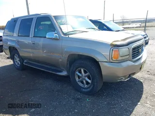 2000 Cadillac Escalade z VIN 1GYEK13R5YR114237, wystawiony jako IAAI lot #41901521 z przebiegiem 139 855 mil mil oraz . Historia ofert i sprzedaży dostępna na DreamBid. Obrazek 1.