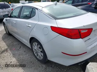2015 Kia Optima LX z VIN 5XXGM4A76FG399865, wystawiony jako IAAI lot #42312813 z przebiegiem 207 747 mil mil oraz . Historia ofert i sprzedaży dostępna na DreamBid. Obrazek 3.