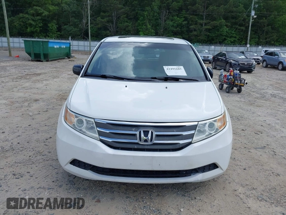 2011 Honda Odyssey EX-L with VIN 5FNRL5H67BB011070, listed as a IAAI auction lot 42491685 with 200,671 mi miles and . Bid and sale history available at DreamBid. Image 12.