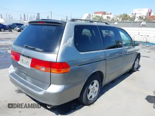 2001 Honda Odyssey EX z VIN 2HKRL18641H504729, wystawiony jako IAAI lot #42337944 z przebiegiem 203 356 mil mil oraz . Historia ofert i sprzedaży dostępna na DreamBid. Obrazek 4.