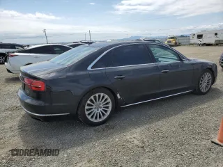 2015 Audi A8 4.0T z VIN WAU32AFD1FN012156, wystawiony jako Copart lot #52759185 z przebiegiem 117 498 mil mil oraz Szkody całkowita. Historia ofert i sprzedaży dostępna na DreamBid. Obrazek 3.
