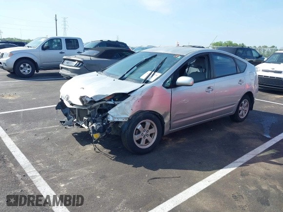 2005 Toyota Prius with VIN JTDKB20U950122932, listed as a IAAI auction lot 42026279 with 153,006 mi miles. Bid and sale history available at carsss.com. Image 2.