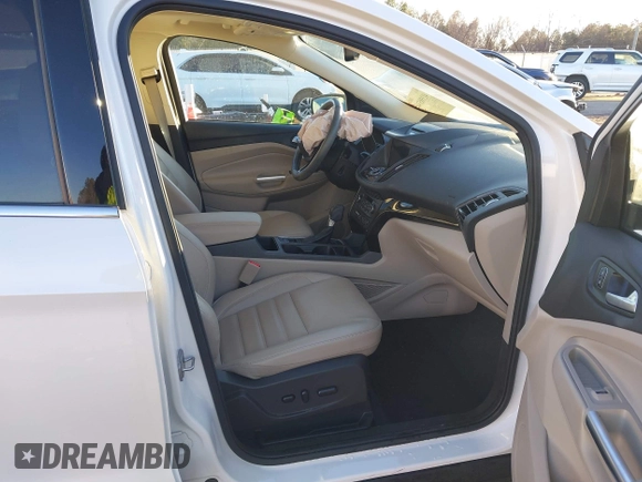 2017 Ford Escape Titanium with VIN 1FMCU0J98HUA75690, listed as a IAAI auction lot 41358534 with 90,376 mi miles. Bid and sale history available at carsss.com. Image 5.