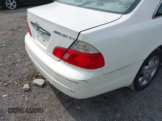 2003 Toyota Avalon XL with VIN 4T1BF28B73U321678, listed as a IAAI auction lot 42083979 with 283,606 mi miles and . Bid and sale history available at carsss.com. Image 12.