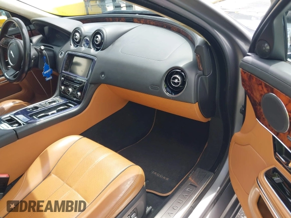 2013 Jaguar XJ with VIN SAJWJ1CD4D8V46305, listed as a IAAI auction lot 42637329 with 101,532 mi miles and . Bid and sale history available at DreamBid. Image 5.