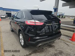 2020 Ford Edge Titanium z VIN 2FMPK3K91LBA60874, wystawiony jako IAAI lot #42470865 z przebiegiem 94 048 mil mil oraz . Historia ofert i sprzedaży dostępna na DreamBid. Obrazek 7.