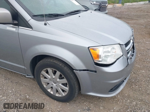 2018 Dodge Grand Caravan SXT z VIN 2C4RDGCG7JR301434, wystawiony jako IAAI lot #42510771 z przebiegiem 270 524 mil mil oraz . Historia ofert i sprzedaży dostępna na DreamBid. Obrazek 19.