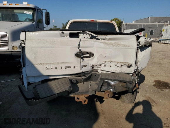 2000 Ford F-350 XL with VIN 1FTSW31F7YED79895, listed as a Copart auction lot 71744804 with 176,241 mi miles and Salvage Title. Bid and sale history available at DreamBid. Image 6.