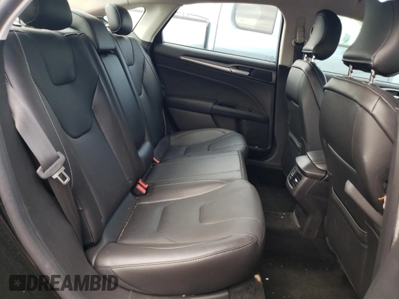 2016 Ford Fusion Titanium z VIN 3FA6P0K90GR399896, wystawiony jako Copart lot #63504265 z przebiegiem 37 066 mil mil oraz Szkoda całkowita • Salvage title. Historia ofert i sprzedaży dostępna na DreamBid. Obrazek 10.