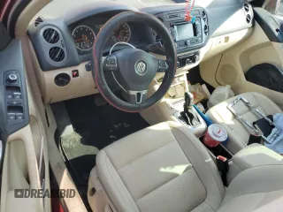 2012 Volkswagen Tiguan SE with VIN WVGAV7AX9CW003857, listed as a Copart auction lot 58356295 with 202,794 mi miles and Salvage title. Bid and sale history available at DreamBid. Image 8.