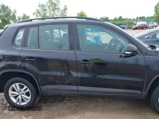 2016 Volkswagen Tiguan S z VIN WVGAV7AX0GW519952, wystawiony jako IAAI lot #42331644 z przebiegiem 92 232 mil mil oraz . Historia ofert i sprzedaży dostępna na DreamBid. Obrazek 13.