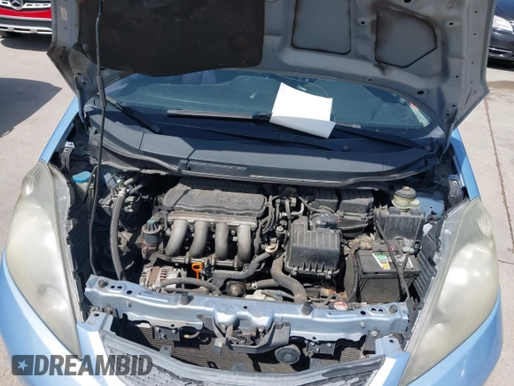 2009 Honda Fit with VIN JHMGE88289S004009, listed as a IAAI auction lot 41803838 with 194,304 mi miles. Bid and sale history available at carsss.com. Image 10.