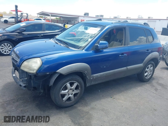 2005 Hyundai Tucson GLS with VIN KM8JN12D45U132721, listed as a IAAI auction lot 42213518 with 153,491 mi miles. Bid and sale history available at carsss.com. Image 13.