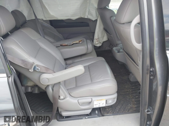 2012 Honda Odyssey Touring with VIN 5FNRL5H90CB045430, listed as a IAAI auction lot 42079770 with 113,901 mi miles and . Bid and sale history available at DreamBid. Image 8.