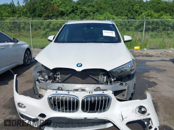 2018 BMW X1 sDrive28i z VIN WBXHU7C34J5H40814, wystawiony jako IAAI lot #42291108 z przebiegiem 93 200 mil mil oraz . Historia ofert i sprzedaży dostępna na DreamBid. Obrazek 12.