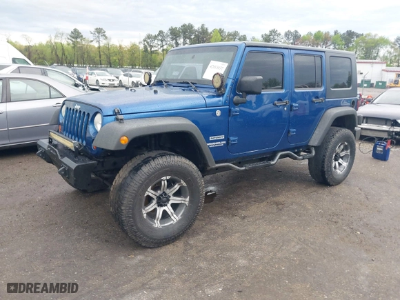 2010 Jeep Wrangler Unlimited Sport with VIN 1J4BA3H11AL144560, listed as a IAAI auction lot 42013032 with 226,233 mi miles. Bid and sale history available at carsss.com. Image 17.