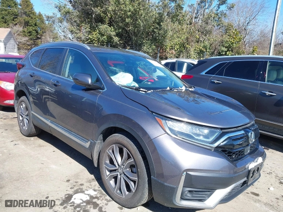2021 Honda CR-V Touring with VIN 7FARW2H9XME012480, listed as a IAAI auction lot 41632487 with 59,684 mi miles. Bid and sale history available at carsss.com. Image 1.