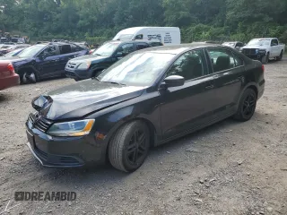 2012 Volkswagen Jetta S with VIN 3VW1K7AJ4CM327157, listed as a Copart auction lot 62657405 with 94,472 mi miles and Salvage title. Bid and sale history available at DreamBid. Image 1.