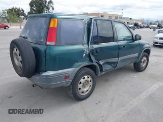 1999 Honda CR-V LX with VIN JHLRD2847XC014469, listed as a IAAI auction lot 41987027 with 307,727 mi miles. Bid and sale history available at carsss.com. Image 4.