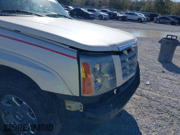 2004 Cadillac Escalade с VIN 1GYEC63TX4R299594, выставлен на аукционе IAAI как лот 41833184 с пробегом 320 822 миль миль и . История ставок и продаж доступна на DreamBid. Изображение 12.