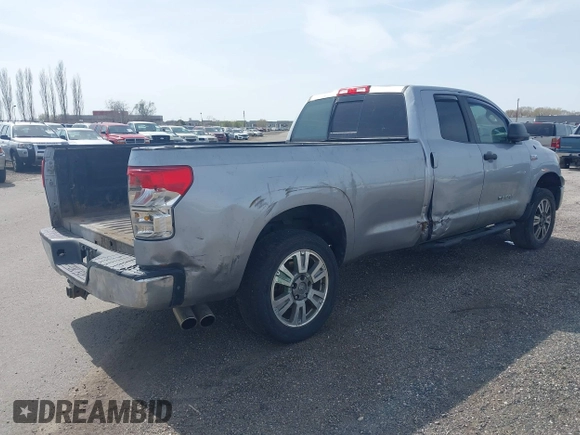 2012 Toyota Tundra 4WD Truck SR with VIN 5TFCW5F19CX012832, listed as a IAAI auction lot 41726453 with 232,078 mi miles. Bid and sale history available at carsss.com. Image 4.