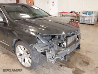2015 Chevrolet Impala LTZ with VIN 2G1165S33F9136329, listed as a IAAI auction lot 41639698 with 198,027 mi miles. Bid and sale history available at carsss.com. Image 20.