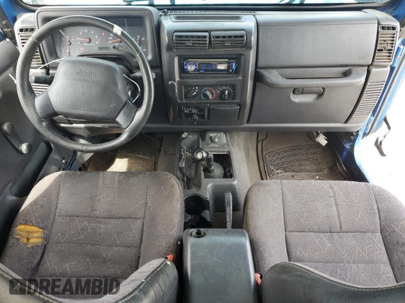 2002 Jeep Wrangler Sport with VIN 1J4FA49S32P762794, listed as a Copart auction lot 52132955 with 243,499 mi miles and Salvage Title. Bid and sale history available at carsss.com. Image 8.