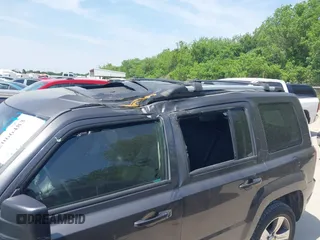 2016 Jeep Patriot Latitude with VIN 1C4NJRFB7GD658594, listed as a IAAI auction lot 42066483 with 146,492 mi miles. Bid and sale history available at carsss.com. Image 6.