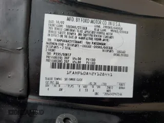 2002 Ford Thunderbird Hardtop Premium z VIN 1FAHP60A42Y128441, wystawiony jako Copart lot #74899624 z przebiegiem Nie podano mil oraz Nie do naprawy • Non repairable. Historia ofert i sprzedaży dostępna na DreamBid. Obrazek 13.