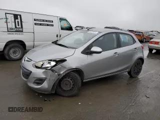 2012 Mazda 2 Sport with VIN JM1DE1KZXC0134278, listed as a Copart auction lot 86220474 with 209,173 mi miles and Salvage Title. Bid and sale history available at carsss.com. Image 1.