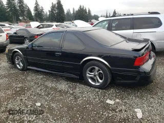 1997 Ford Thunderbird LX with VIN 1FALP62W1VH110468, listed as a Copart auction lot 88331705 with 84,349 mi miles and Salvage Title. Bid and sale history available at DreamBid. Image 2.