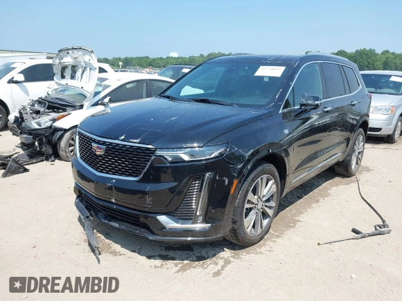 2021 Cadillac XT6 Premium Luxury with VIN 1GYKPDRS0MZ153523, listed as a IAAI auction lot 42770895 with 19,843 mi miles and . Bid and sale history available at DreamBid. Image 17.