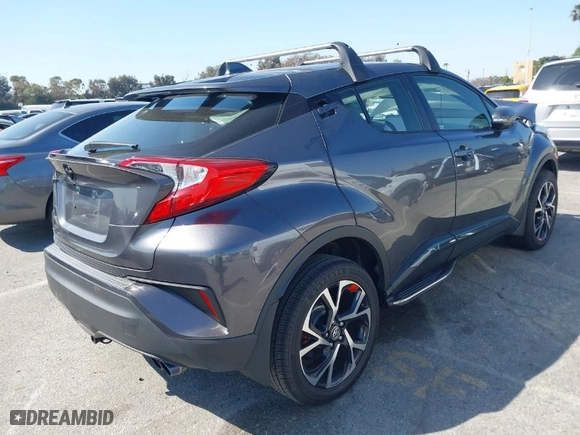 2019 Toyota C-HR XLE with VIN JTNKHMBX4K1026497, listed as a IAAI auction lot 41848644 with 53,211 mi miles. Bid and sale history available at carsss.com. Image 4.