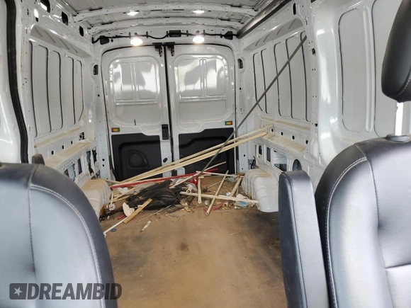 2023 Ford Transit Cargo с VIN 1FTBR1C8XPKB12972, выставлен на аукционе Copart как лот 56730265 с пробегом 47 835 миль миль и Списание • Salvage title. История ставок и продаж доступна на DreamBid. Изображение 10.