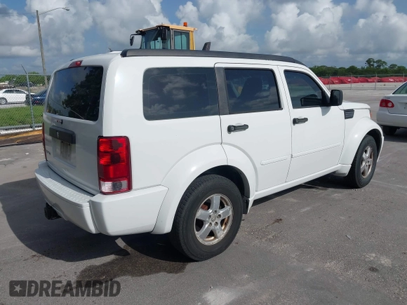 2007 Dodge Nitro SXT z VIN 1D8GT28K17W530705, wystawiony jako IAAI lot #42456213 z przebiegiem 217 175 mil mil oraz . Historia ofert i sprzedaży dostępna na DreamBid. Obrazek 4.