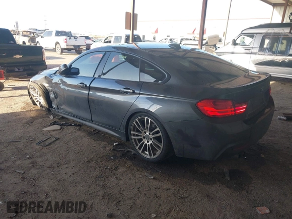 2015 BMW 4 Series 428i with VIN WBA4A5C54FG051307, listed as a IAAI auction lot 41774596 with 126,852 mi miles and . Bid and sale history available at carsss.com. Image 3.