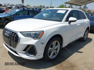 2019 Audi Q3 S line Premium z VIN WA1DECF39K1079763, wystawiony jako IAAI lot #42160517 z przebiegiem 66 924 mil mil oraz . Historia ofert i sprzedaży dostępna na DreamBid. Obrazek 2.