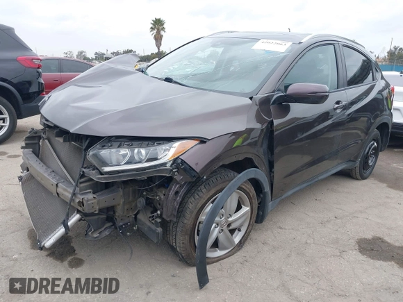 2019 Honda HR-V EX with VIN 3CZRU5H55KM718842, listed as a IAAI auction lot 42022063 with 59,610 mi miles. Bid and sale history available at carsss.com. Image 2.