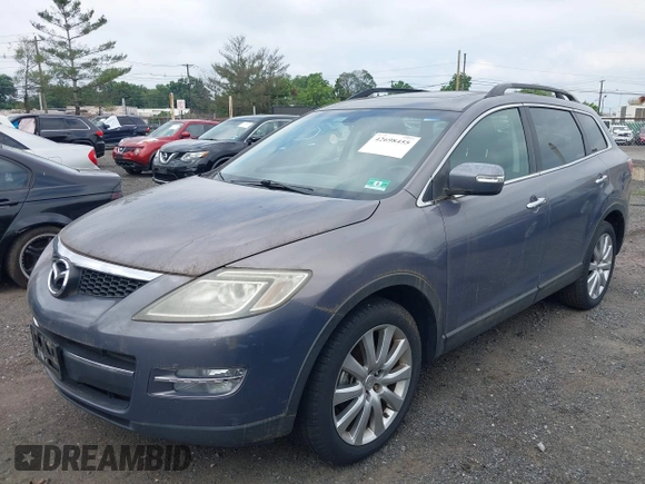 2008 Mazda CX-9 Touring with VIN JM3TB38V980157733, listed as a IAAI auction lot 42698455 with 167,249 mi miles and . Bid and sale history available at DreamBid. Image 2.
