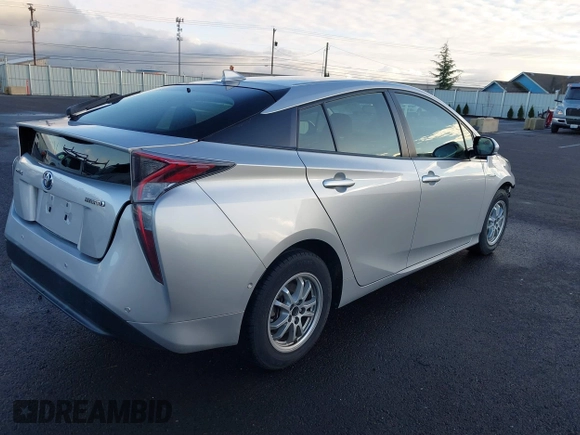 2018 Toyota Prius Two with VIN JTDKARFU8J3547408, listed as a IAAI auction lot 41313198 with 76,060 mi miles. Bid and sale history available at carsss.com. Image 4.