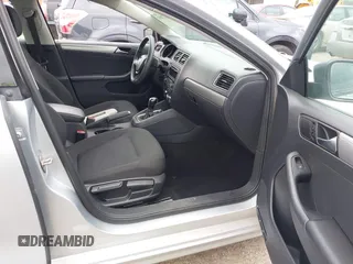 2015 Volkswagen Jetta Sedan 1.8T SE with VIN 3VWD17AJ0FM309503, listed as a IAAI auction lot 42127051 with 223,725 mi miles. Bid and sale history available at carsss.com. Image 5.