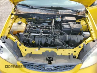 2006 Ford Focus S z VIN 1FAHP31N06W222169, wystawiony jako Copart lot #60300995 z przebiegiem 128 734 mil mil oraz Szkoda całkowita • Salvage title. Historia ofert i sprzedaży dostępna na DreamBid. Obrazek 11.